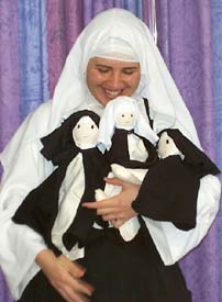 Sister with nun dolls