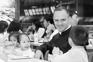 Fr. Davide Pagliarani with children