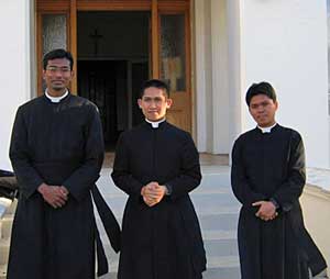 Three Asian who took the cassock